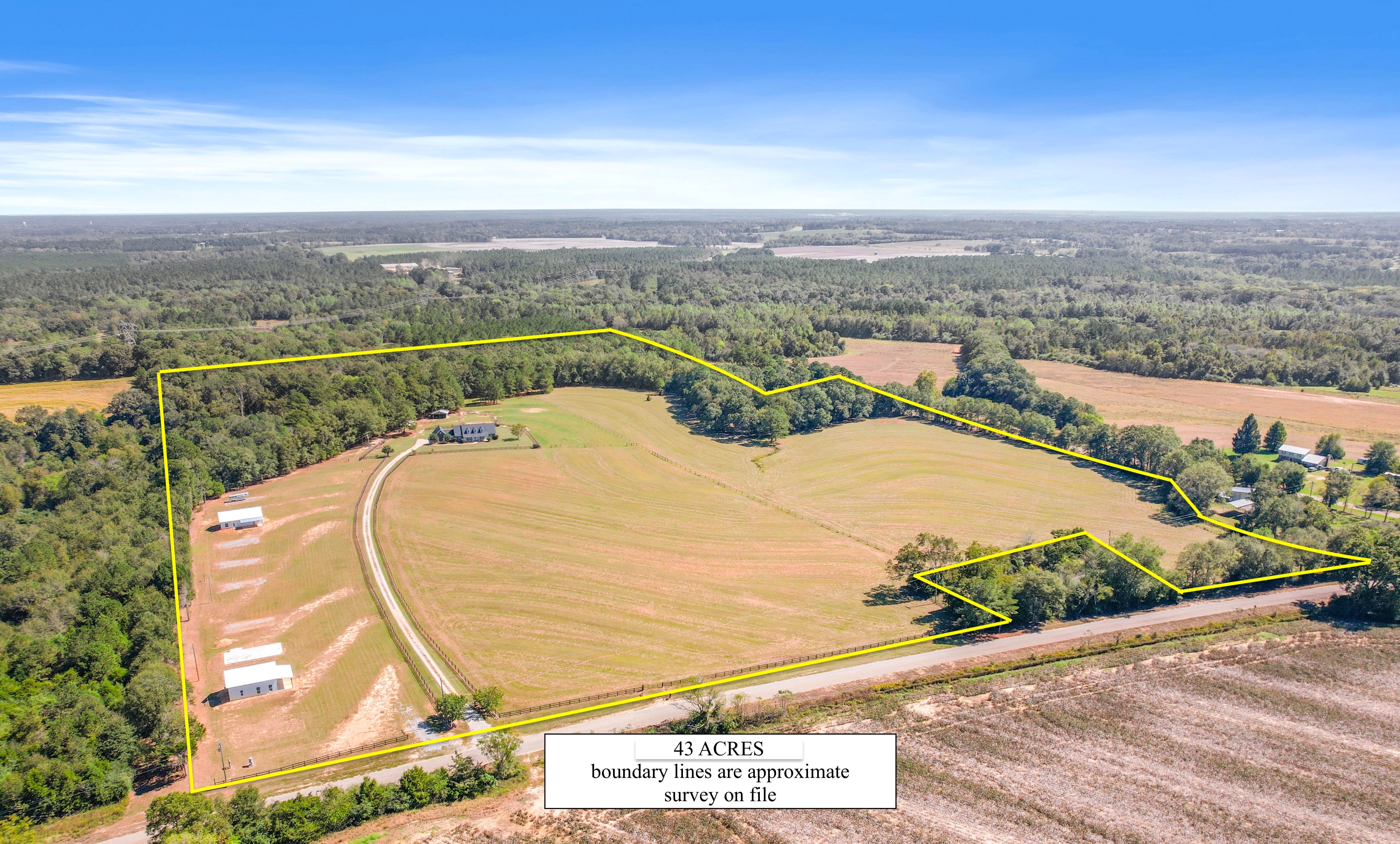 Aerial view of the 43-acre gated estate with boundary lines